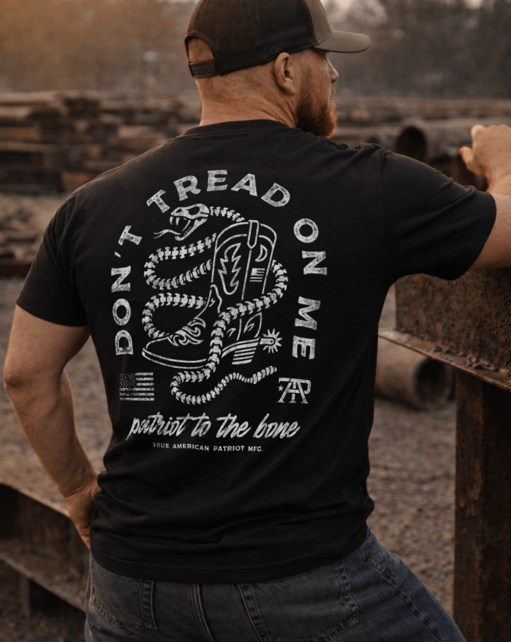 Man Wearing True American Patriot Mfg "Don't Tread On Me" Tshirt outdoors