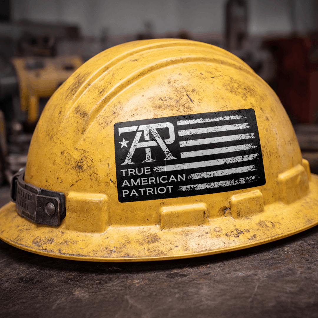 True American Patriot Distressed Flag Logo Decal on worn hard hat