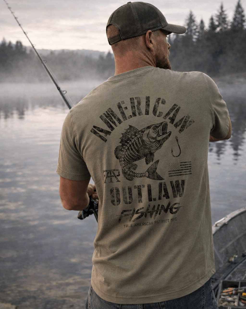 Man fishing while wearing a True American Patriot American Outlaw Fishing Tee