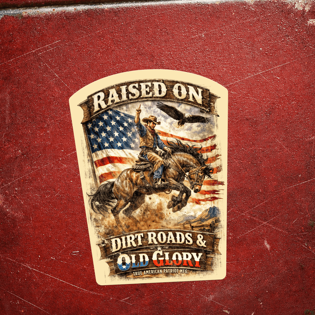 True American Patriot Mfg Raised on Dirt Roads & Old Glory - Decal on scratched red toolbox