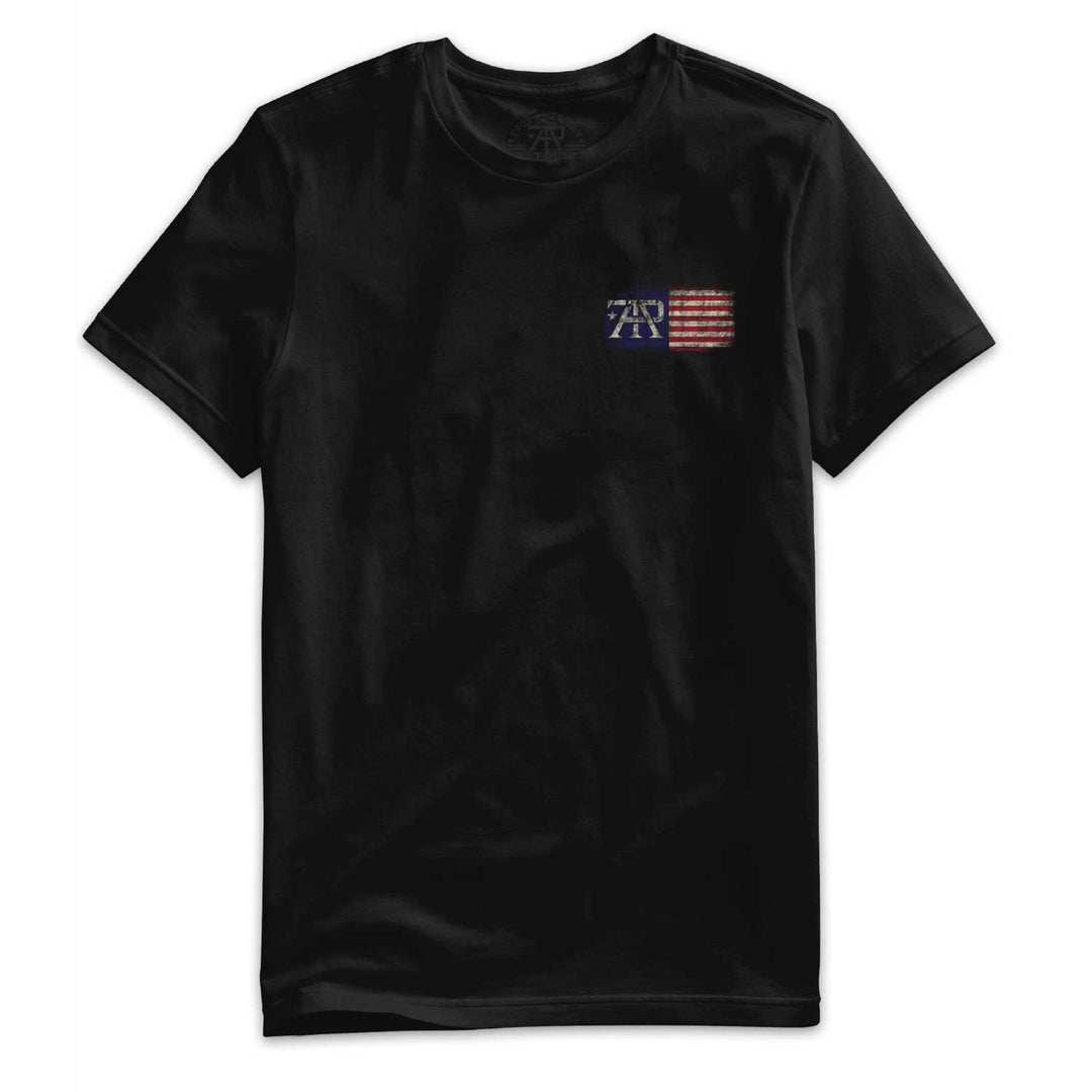 Front of Stay True Flag Tee in Black featuring distressed TAP American flag left chest logo by True American Patriot MFG.