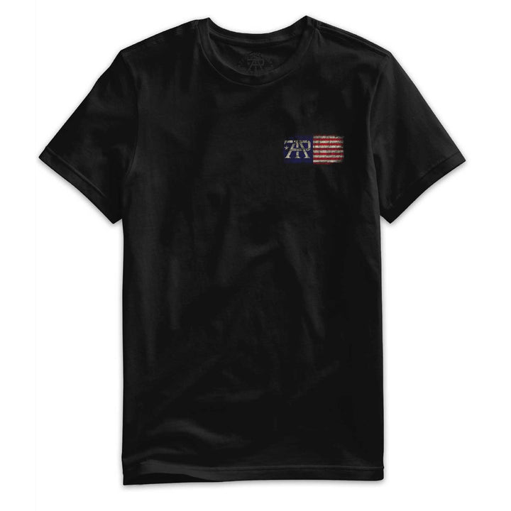 Front of Stay True Flag Tee in Black featuring distressed TAP American flag left chest logo by True American Patriot MFG.